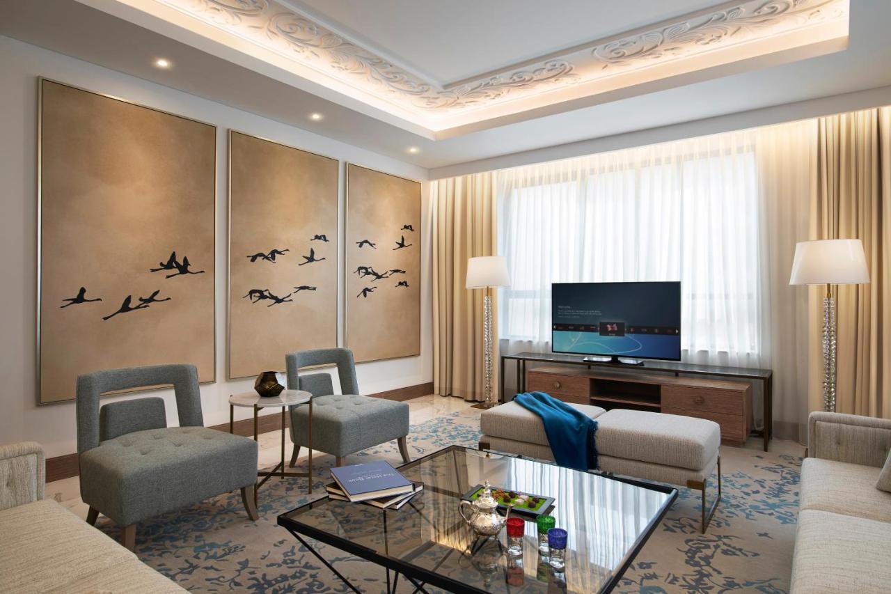 Al Jaddaf Rotana Suite Hotel Dubai Exterior photo A living room