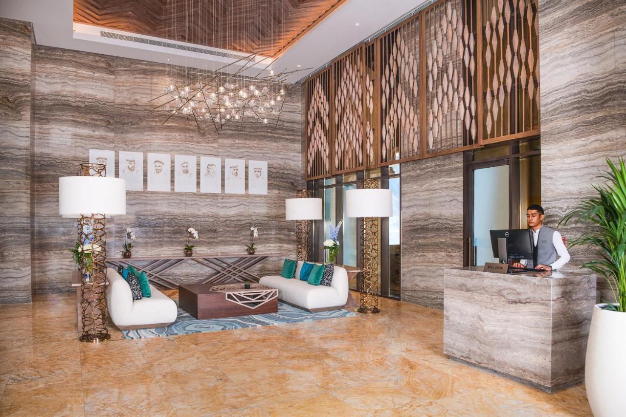 Al Jaddaf Rotana Suite Hotel Dubai Exterior photo Lobby