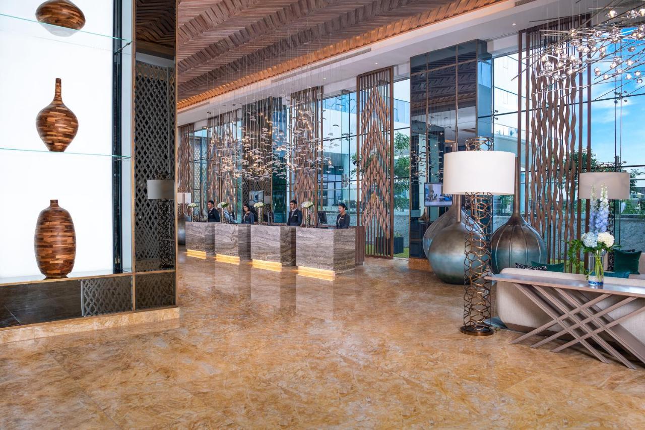 Al Jaddaf Rotana Suite Hotel Dubai Exterior photo Lobby