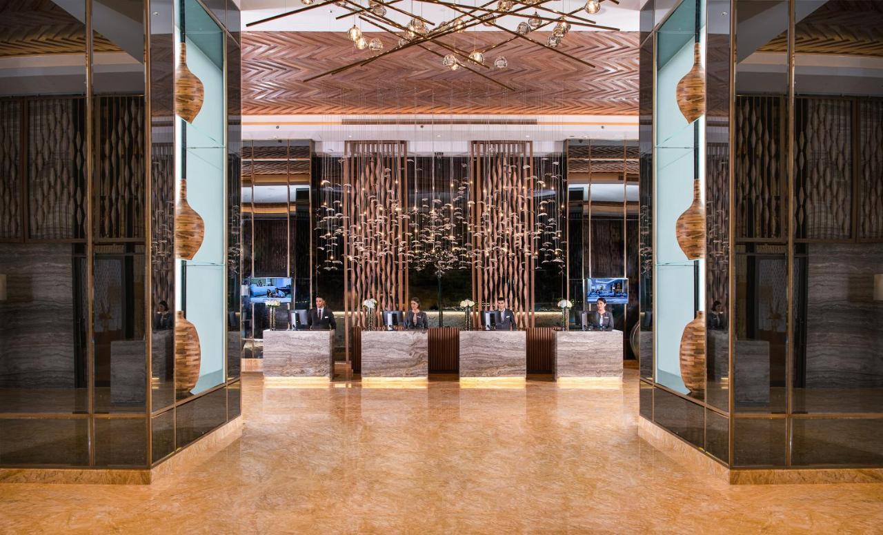 Al Jaddaf Rotana Suite Hotel Dubai Exterior photo The lobby of the hotel