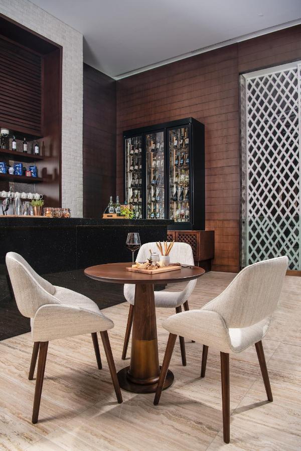 Al Jaddaf Rotana Suite Hotel Dubai Exterior photo Wine bar