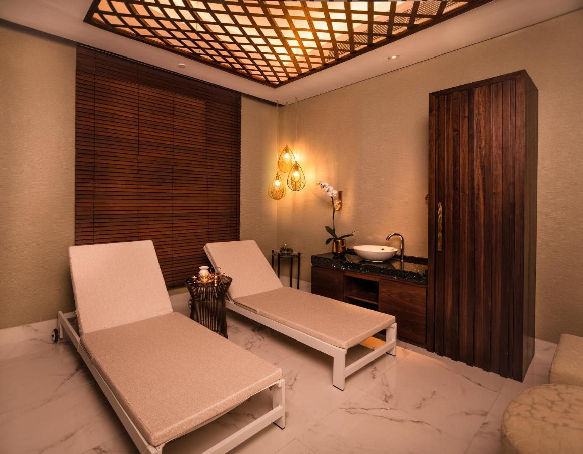 Al Jaddaf Rotana Suite Hotel Dubai Exterior photo A treatment room at the spa